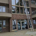 Three story window cleaning ladder spotless - Class Act Glass Best Window Cleaning Services in Mankato and Southern Minnesota