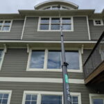Window cleaning with a pole four stories attic spotless window cleaning pure water system - Class Act Glass Best Window Cleaning Services in Mankato and Southern Minnesota